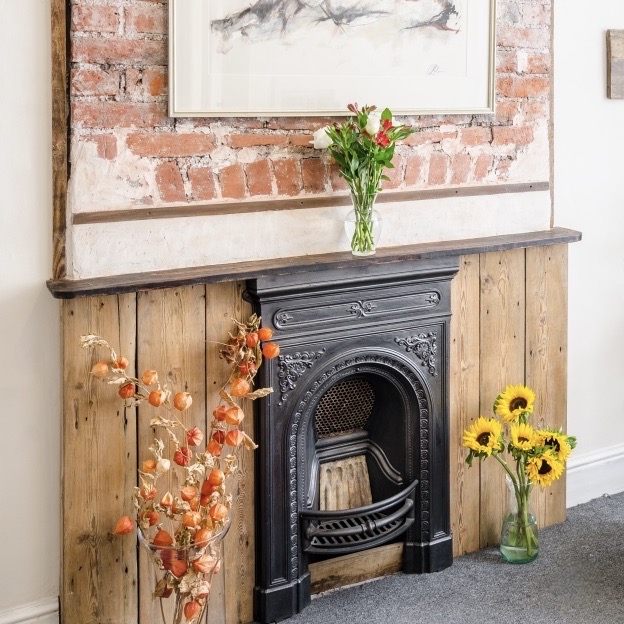 Fireplace and flowers in a therapy room